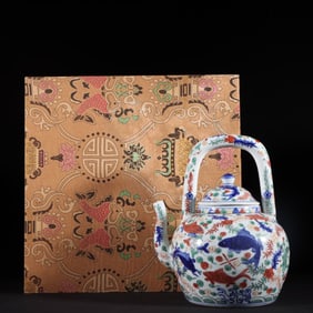 An Exquisite Wucai Fish and Lotus Pattern Seawater Pattern Ewer