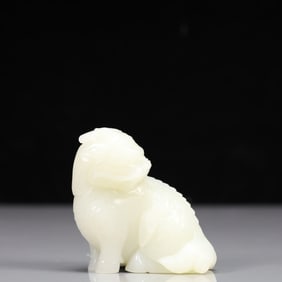 An Exquisite White Jade Lion Ornament