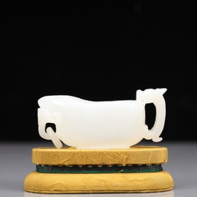 An Exquisite White Jade Beast-Face Pattern Cup