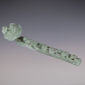An Exquisite White Jade Flower and Fruit Pattern Ruyi Ornament