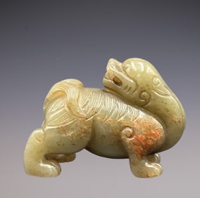An Exquisite White Jade Auspicious Beast Ornament