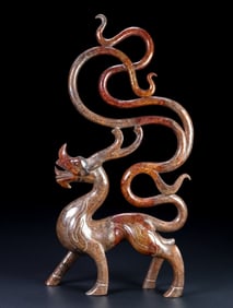 An Exquisite Archaic Jade Auspicious Beast Ornament