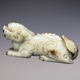 An Exquisite White Jade Auspicious Beast Ornament