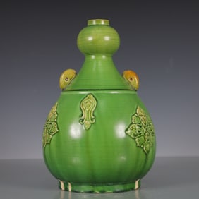 A Exquisite Trio-colored glazed pottery of the Tang Dynasty Flower Pattern Double-Ears Vase