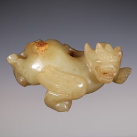 An Exquisite White Jade Auspicious Beast Ornament