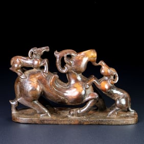 An Exquisite Archaic Jade Sheep Ornament
