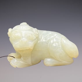 An Exquisite White Jade Auspicious Beast Ornament