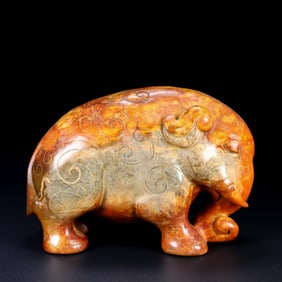 An Exquisite Archaic Jade Elephant Ornament