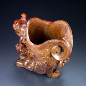 An Exquisite Archaic Jade Auspicious Beast Goblet