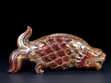 An Exquisite Archaic Jade Auspicious Beast Ornament
