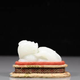 An Exquisite White Jade Lion Ornament