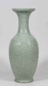 An Exquisite Celadon Glazed Lotus Pattern Vase