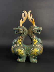 An Archaic Bronze Mythical Beast with Jade Horns, Gold Silver Inlay