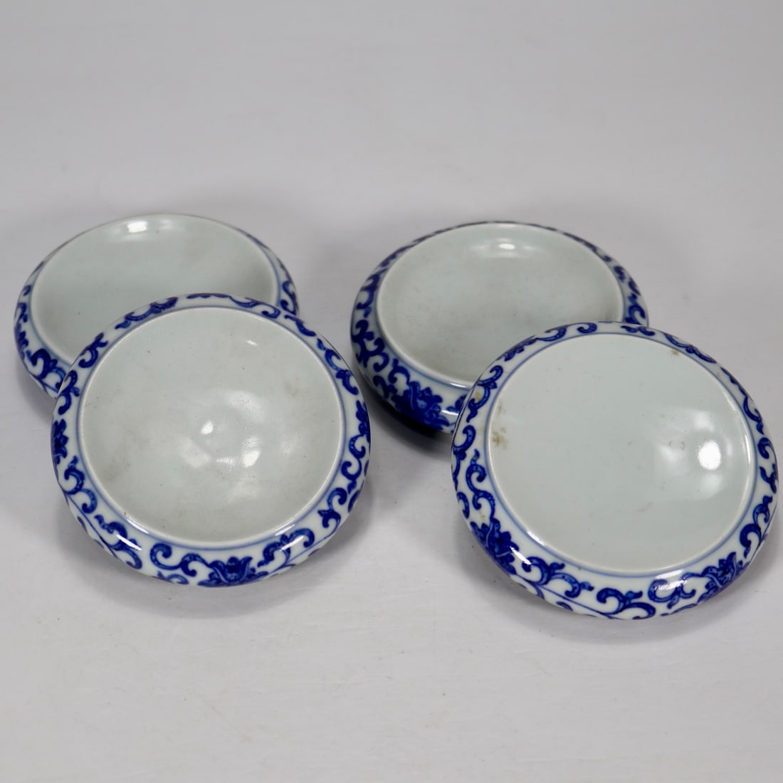 Blue and White Lotus Pattern Tea Cup Mat: A Rare Blue and White Lotus Pattern Tea Cup Mat,Qing Dynasty,China,Qianlong Four-character Mark,Size:2.2cmx8.6cm 青花缠枝莲纹茶杯垫,中ࢲ