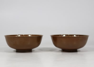 A pair of purple and gold glaze bowls