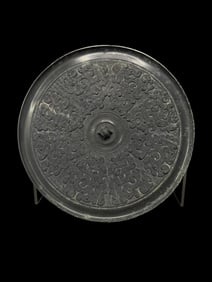 An Archaic Bronze Mirror with Coiling Dragon Design