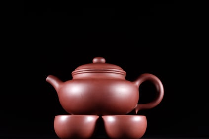 A set of Fine purple sand antique teapots
