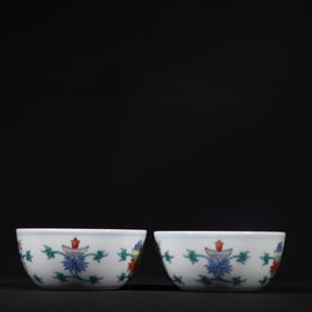A pair of rare Doucai Lotus Pattern Cup