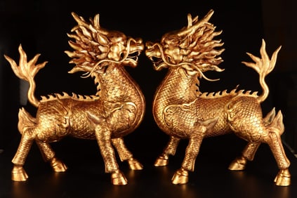 A Rare Gilt Bronze Kylin tanding Statue