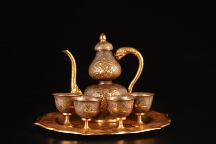 A Set of Rare Gilt Phoenix Pattern Wine Set