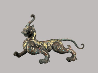 An Archaic Bronze Unicorn with Gold Silver Inlay
