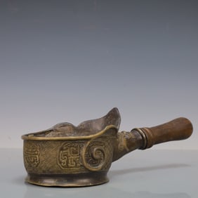 A Rare Bronze dragon ironing board