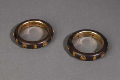 A Rare Pair of Aloeswood Gilt Bracelets
