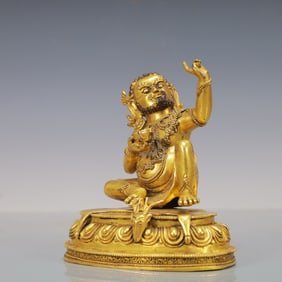A Rare Gold-plated bronze god of wealth statue