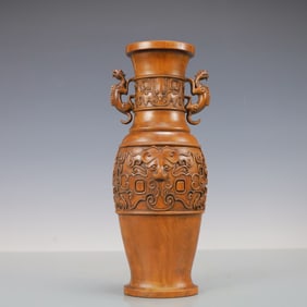 A Rare Carved Yellow Wood Vase