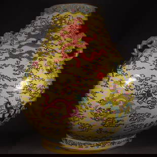 A Huge Yellow Ground Famille-Rose Auspicious Cloud and Dragon Pattern Double-Ears Vase: A Huge Yellow Ground Famille-Rose Auspicious Cloud and Dragon Pattern Double-Ears Vase,Qing Dynasty, China,Qianlong Six-character Mark,Size:63cmx53cm &#40644;&#22320;&#31881;&#24425;&#31077;&#20113;&#