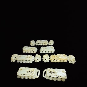 A Set of Fine White Jade Flower and Bird Pattern Ornaments