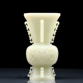 An Exquisite White Jade Beast-Face Pattern Vase