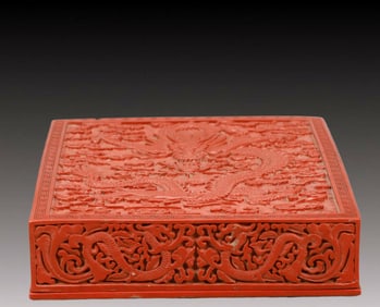 A Craved Red Lacquer Auspicious Cloud and Dragon Pattern Box