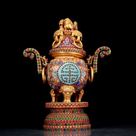 A stunning gilt bronze censer with double ears, tripod and animal patterns inlaid gems