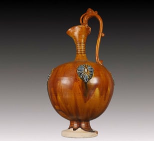 A Rare Tang Tri-Color Glazed Pottery Dragon-Handle Ewer