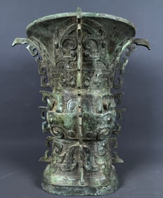 An Archaic Bronze Taotie Pattern Zun