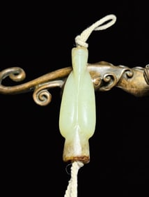 An Exquisite White Jade Pendant