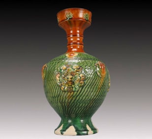 An Exquisite Tang Tri-Color Glazed Pottery Beast-Face Pattern Vase