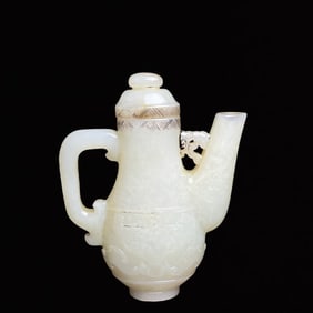 An Exquisite White Jade Beast-Face Pattern Flagon