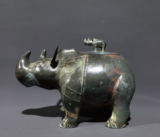 An Archaic Bronze Rhinoceros-Shaped Zun