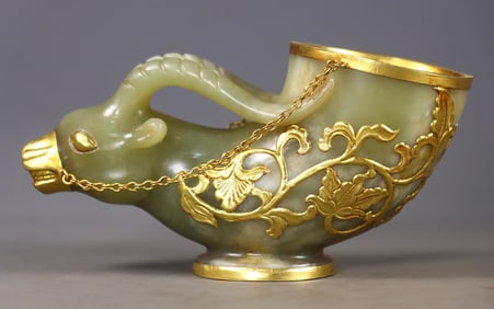 An Exquisite White Jade Cover with Gold Buffalo-Head Cup