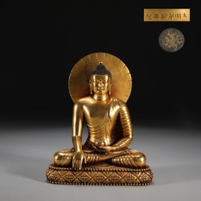 A Rare Gilt Bronze Statue of Sakyamuni