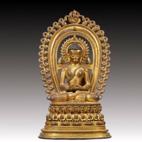A Solemn Gilt Bronze Statue of Sakyamuni