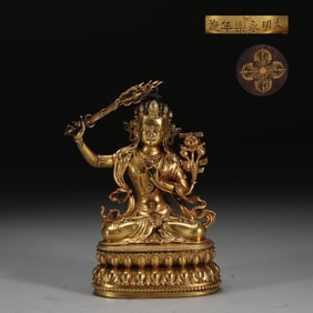 A Rare Gilt Bronze Statue of Manjusri