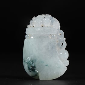 A Fine Jadeite Auspicious Beast Pendant