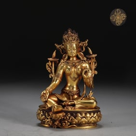 A Rare Gilt Bronze Statue of Green Tara