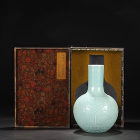 An Exquisite Sky Blue Glazed Beast-Face Pattern Vase
