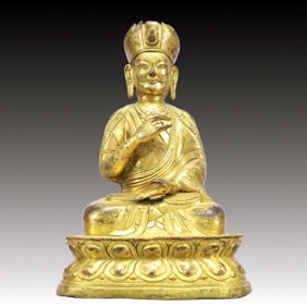 A Solemn Gilt Bronze Statue of Guru