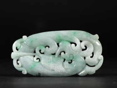 A Fine Jadeite Auspicious Beast Pendant