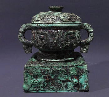 An Archaic Bronze Beast-Face Pattern Double-Ears Food Vessel,With Base: An Archaic Bronze Beast-Face Pattern Double-Ears Food Vessel,With Base,Shang and Zhou Dynasty, China,Size:(Food Vessel)16cmx16cmx10.5cm,(Base)6cmx11.5cmWeight:1313g &#20013;&#22269;&#21830;&#21608;&#2